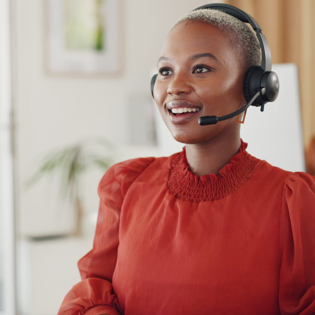 contact us, call center and crm, black woman at computer in office, customer service agent with headset and smile. help desk, telemarketing or sales consultant, happy advisory support and consulting.